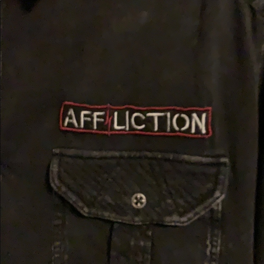 Men’s black affliction shirt with stitching